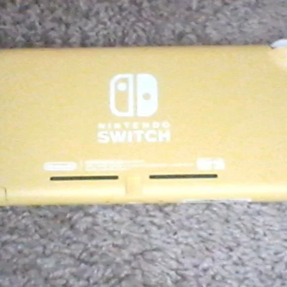 nitendo switch lite with carry case and 3 games
